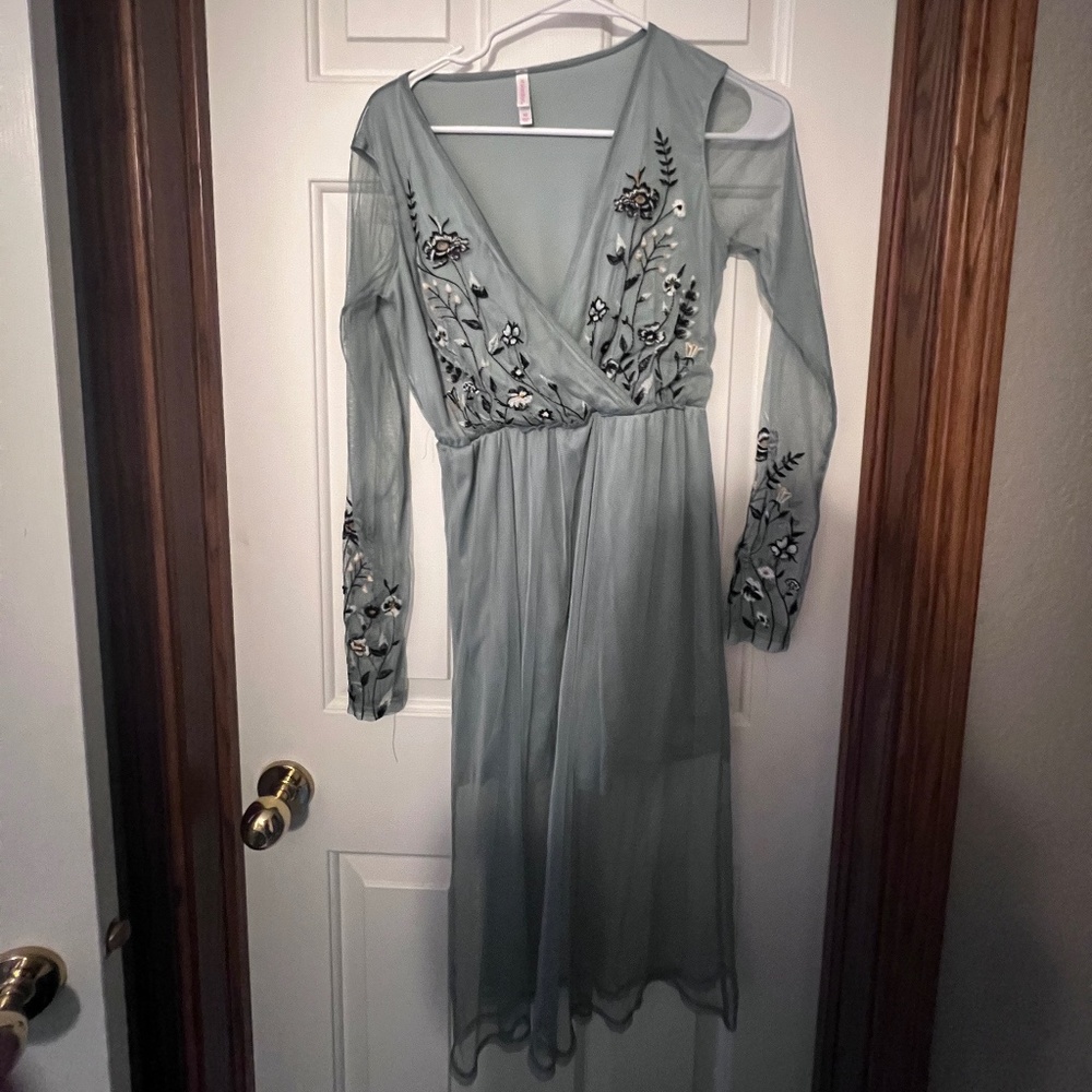 Green dress with flower details